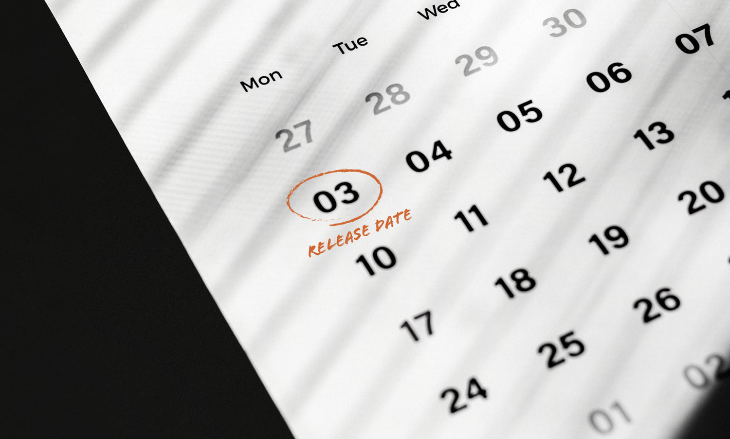 A calendar with a date circled in red that says "release date."