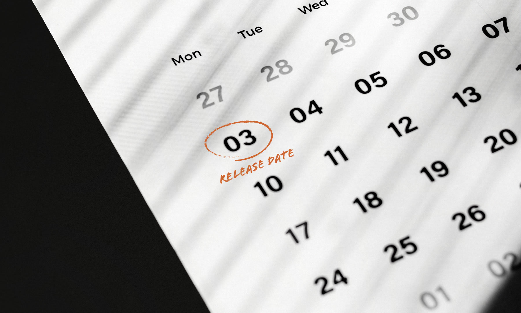 A calendar with a date circled in red that says "release date."