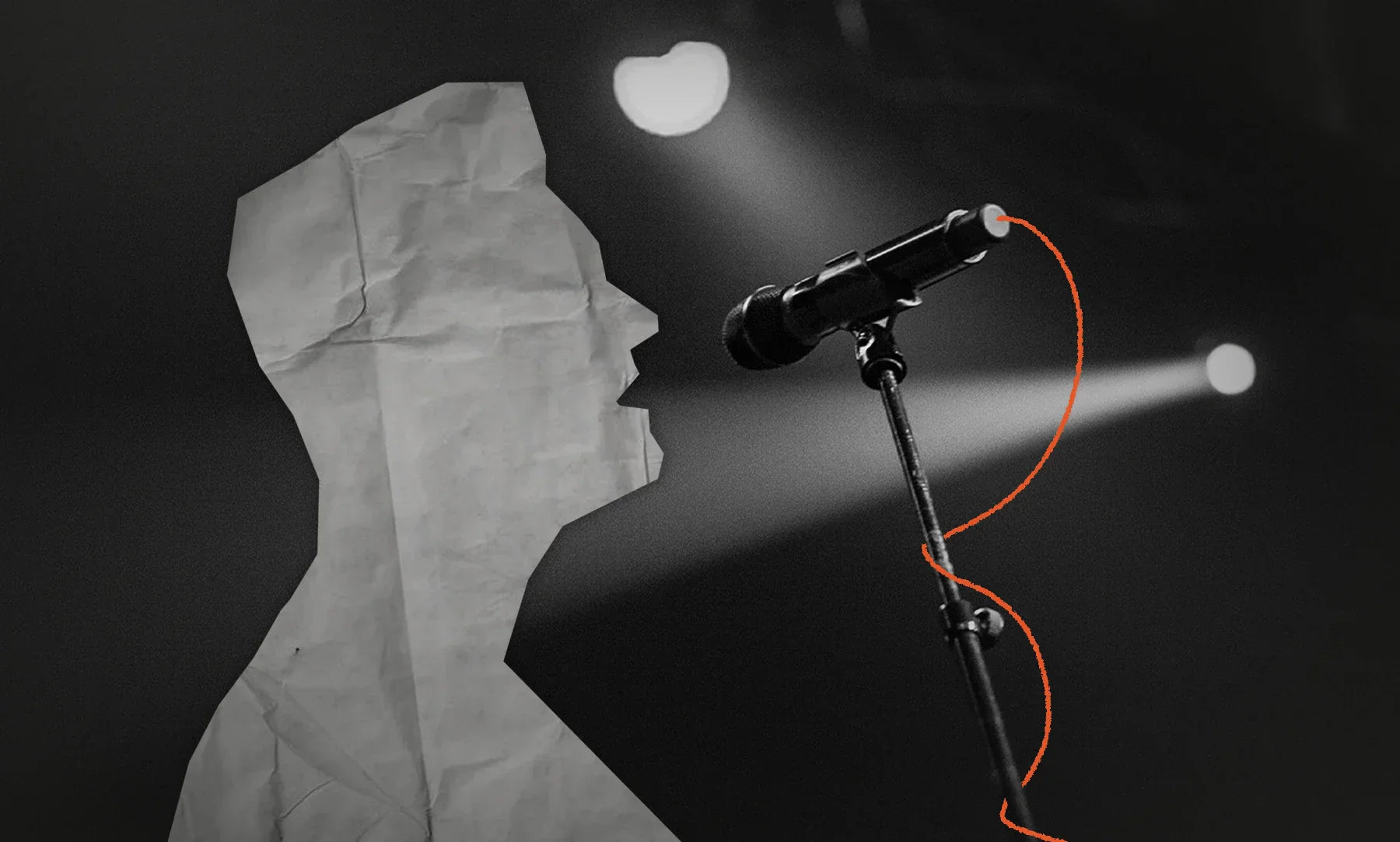 A man singing into a microphone